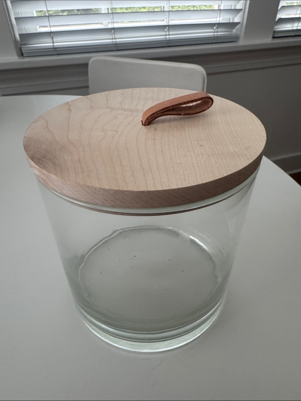 Jenni Kayne Home Glass Storage Jar with Light Wood Lid and Tan Leather Loop